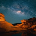 Milky way over canyon rocks